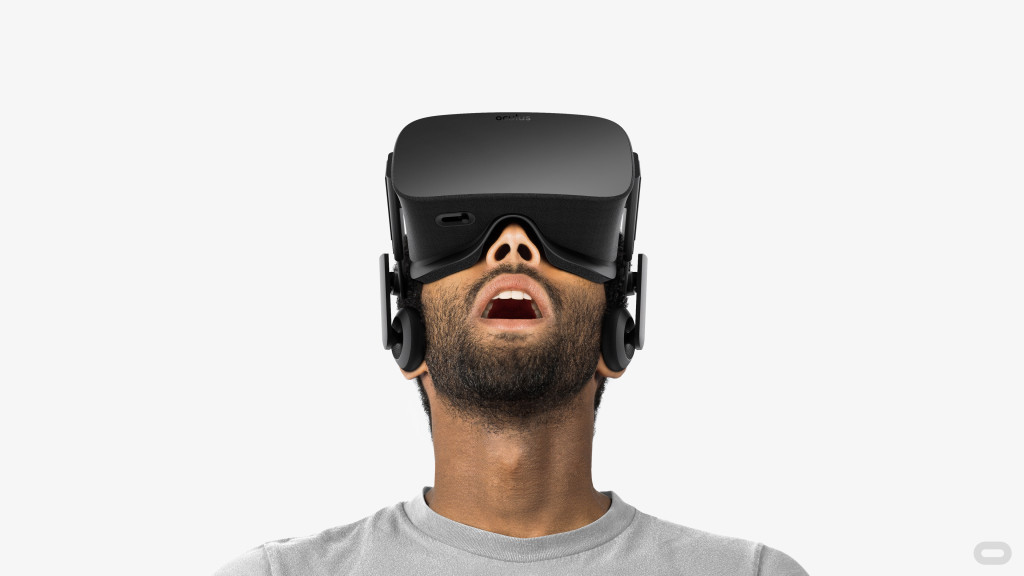 Person wearing Oculus Rift Virtual Reality headset with gaping mouth