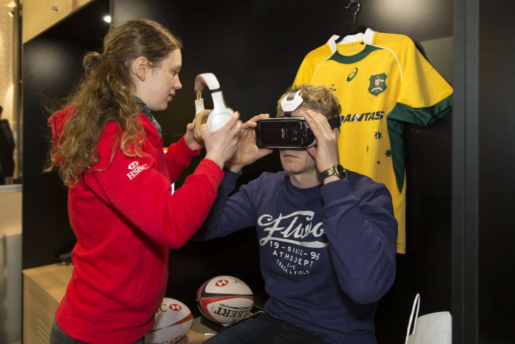 HSBC Wallabies player using Virtual Reality Goggles with team member