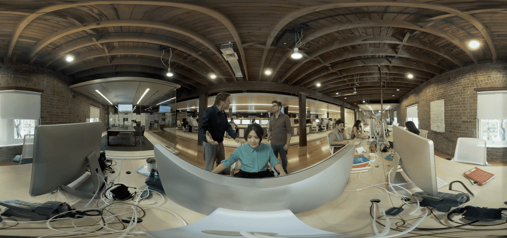 Screenshot of people in office for 360 VR experience.