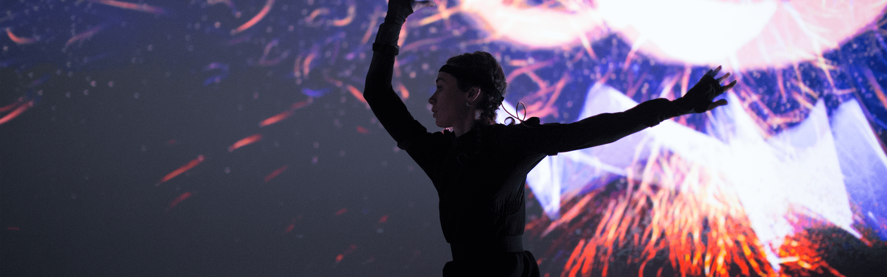 Lady dancing for Real-Time light experience.
