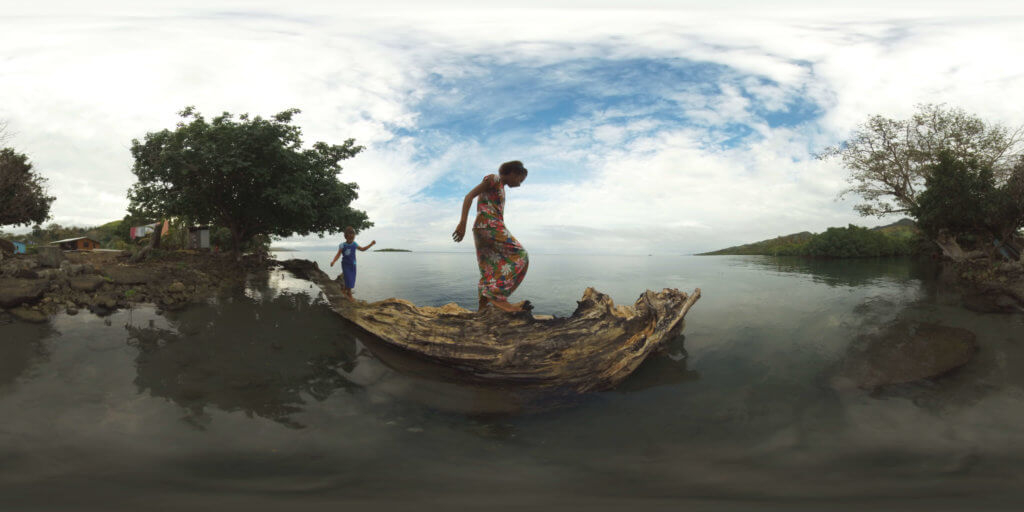 360 view of Fijian girls exploring a fallen tree near their home in the 'Our Home, Our People' virtual reality project