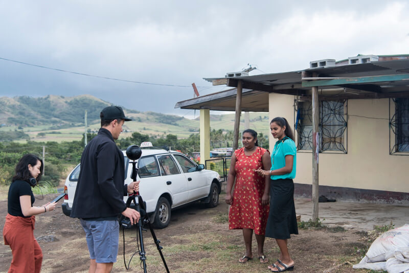 The director of 'Our Home, Our People' virtual reality film sets up a 360 shot in Rakraki, Fiji