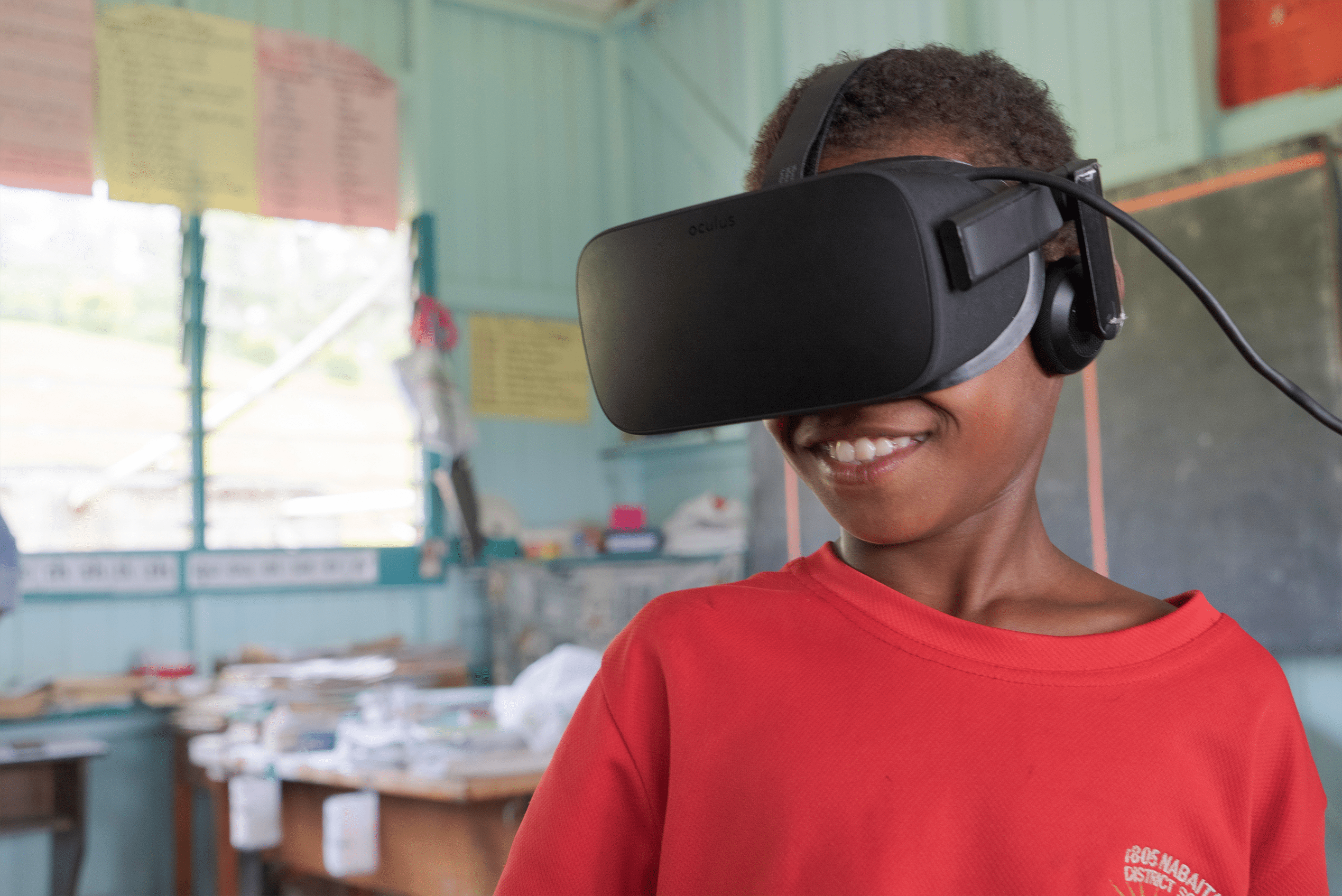 Child experiencing S1T2’s Beyond the Stars virtual reality through an Oculus Rift headset