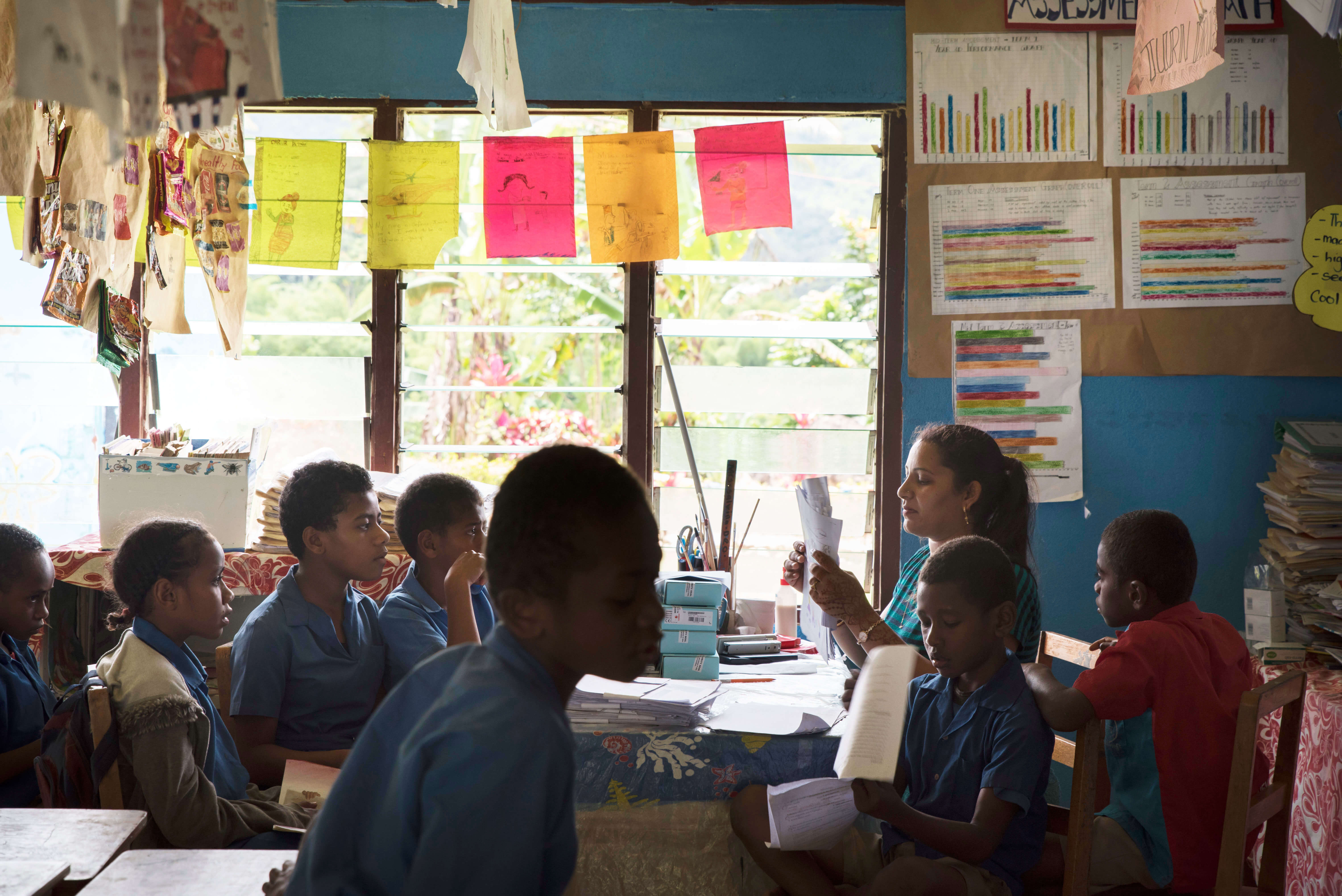 A class of students and their teacher prepare for a lesson with the Beyond the Stars program.