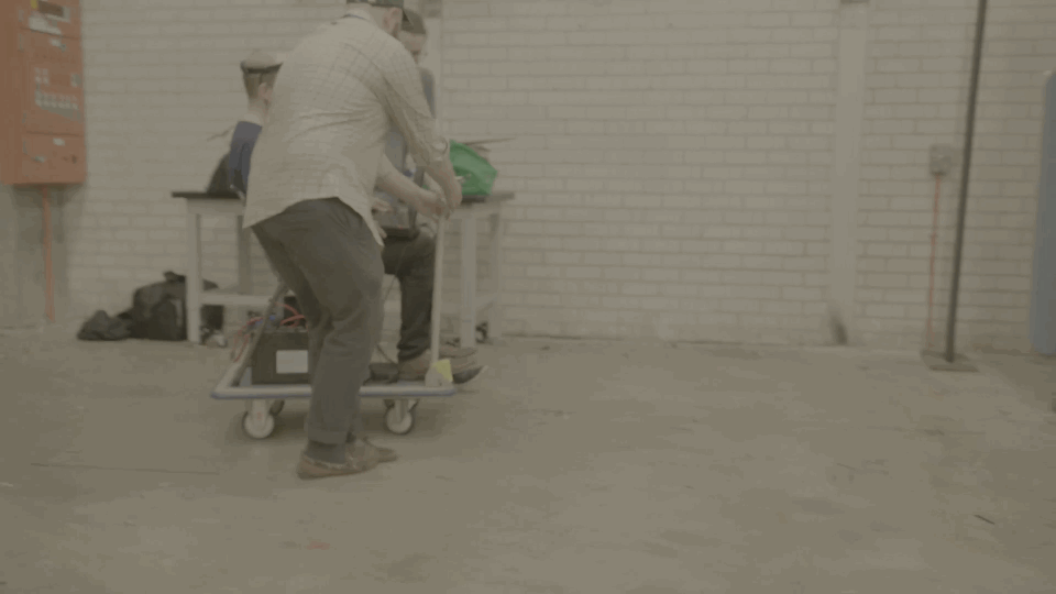 Man wearing a virtual reality headset tests the Optitrack system for Ford Explorer VR