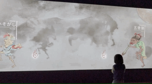 Young child reacts to the interactive yokai animations in S1T2’s interactive touch wall for the Japan Supernatural exhibition at the Art Gallery of NSW